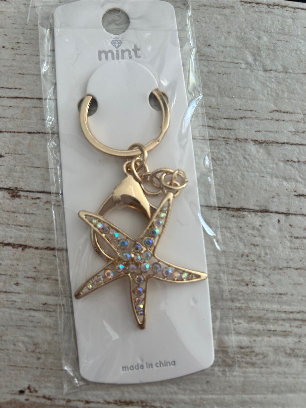 5/)25 Mint Gold Starfish Keyring with Iridescent Rhinestones
